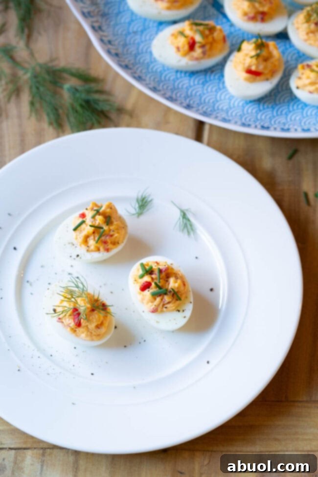 Non-traditional deviled eggs recipe with pimento cheese om plate