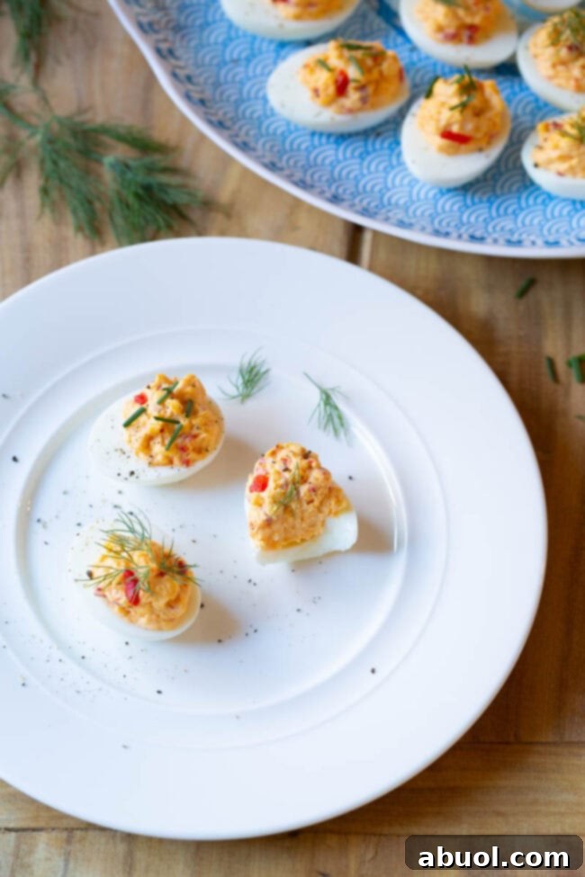 Special hard boiled egg recipe -Pimento Cheese Deviled Eggs - with bite taken out