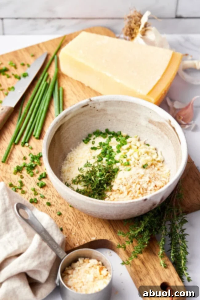Bowl of plain breadcrumbs and freshly chopped chives, key ingredients for the crust.
