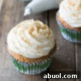 Hummingbird Cake Cupcakes with Sour Cream Frosting on ASpicyPerspective.com