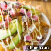Ahi Wonton Nachos with Wasabi Mayo and Fresh Mango Pico de Gallo on ASpicyPerspective.com #nachos