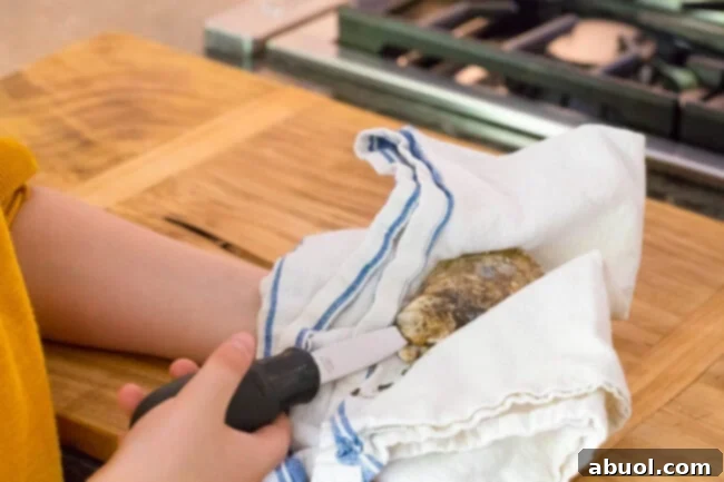 Prying open oyster shell.