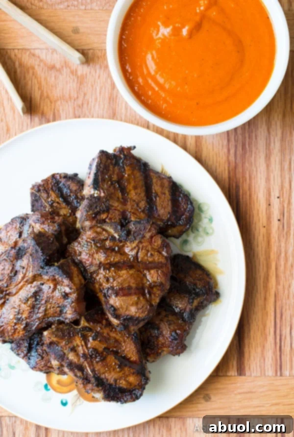 Grilled Lamb Loin Chops Recipe overhead shot with sauce on the side