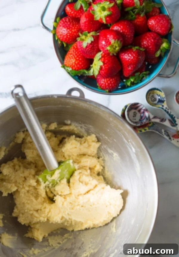 Smooth and ready sugar cookie dough for the pizza base