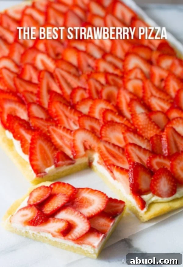 A beautiful and inviting strawberry dessert pizza slice