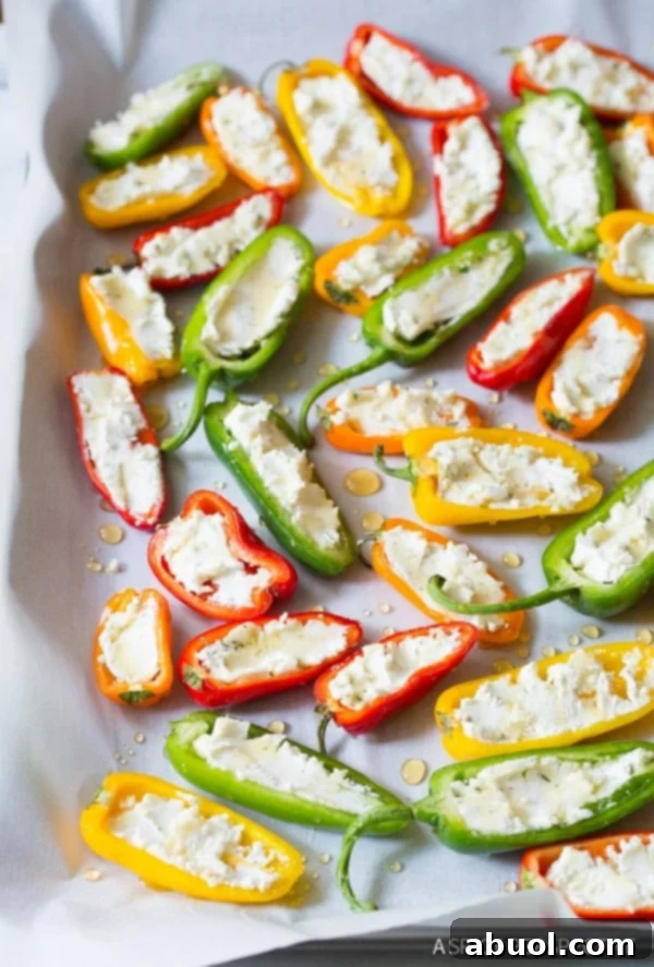 Flavorful Stuffed Mini Pepper Poppers 6 Easy to Make 3-Ingredient Mini Stuffed Peppers Recipe on ASpicyPerspective.com - So good!