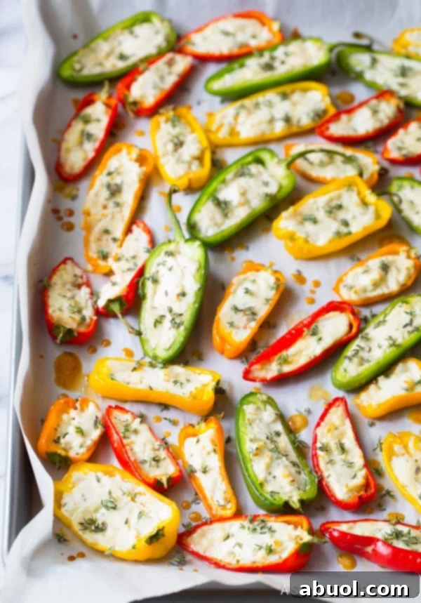 Flavorful Stuffed Mini Pepper Poppers 7 Awesome 3-Ingredient Mini Stuffed Peppers Recipe on ASpicyPerspective.com - So good!