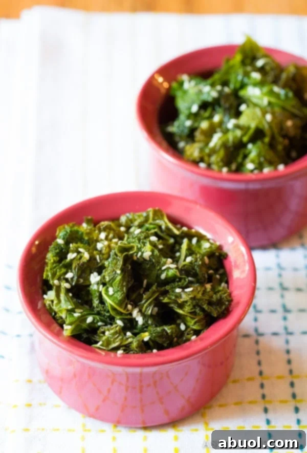 Honey Butter Wilted Kale 5 Simple Southern Wilted Honey Butter Kale Recipe, beautifully plated and garnished with sesame seeds.