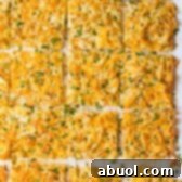 Zesty Baked Hash Brown Recipe on ASpicyPerspective.com #breakfast #potatoes
