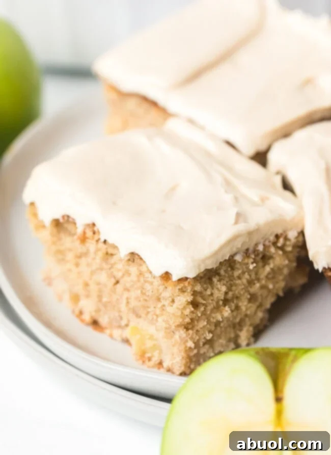 Apple Sheet Cake on plate cut into squares. 