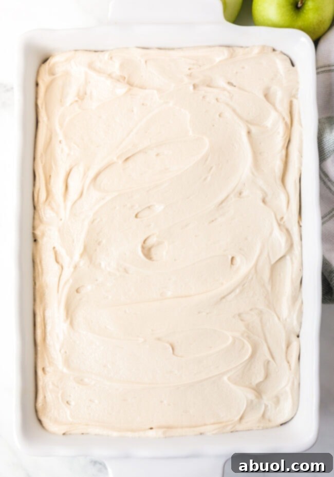 frosted apple cake in the baking pan. 