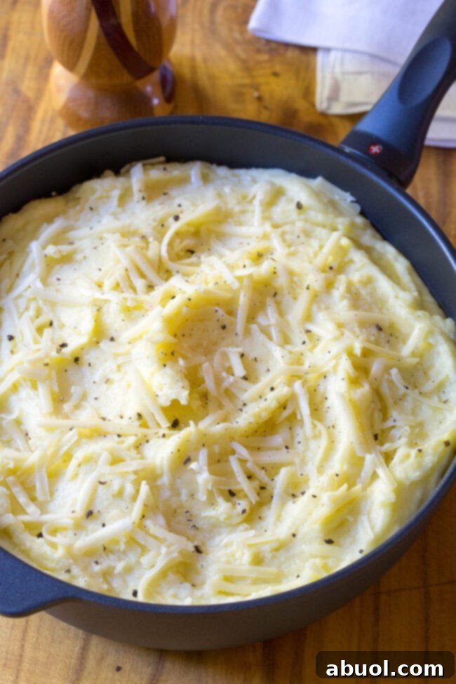 small saucepan with these cheesy mashed potatoes