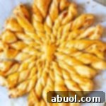 Finished Sunburst Pull Apart Bread, golden and flaky, ready to serve.