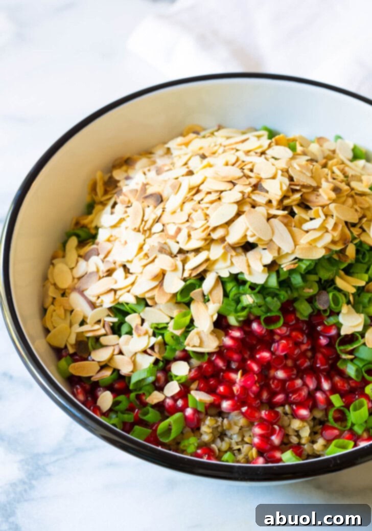 All ingredients for lentil salad in a bowl, mixed together and ready to serve.