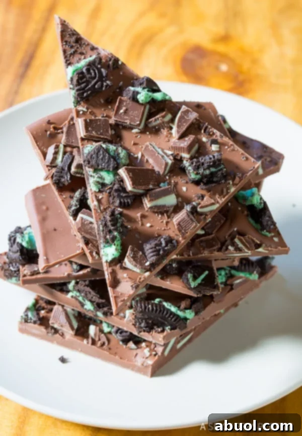 Festive Peppermint Bark pieces on a holiday platter