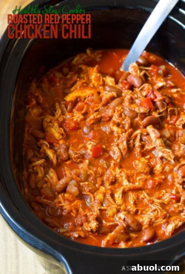 Roasted Red Pepper Crockpot Chicken Chili 3 Crockpot Chicken Chili Recipe in a black pot.