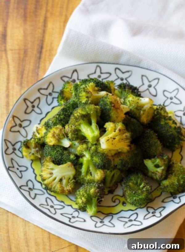 The Perfect Roasted Broccoli Side Dish with charred garlic flavor | ASpicyPerspective.com