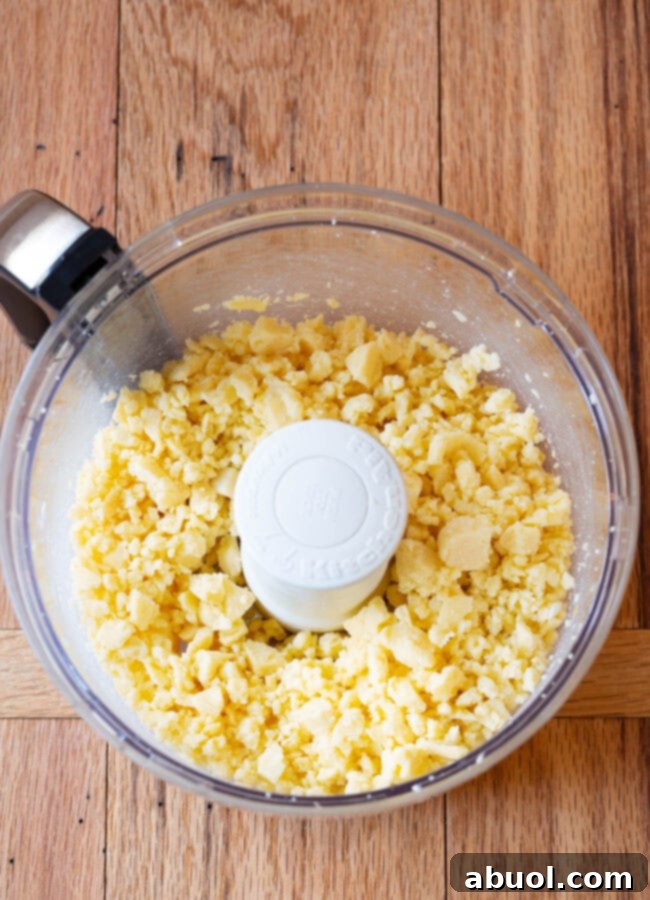 food processor creaming the cheese