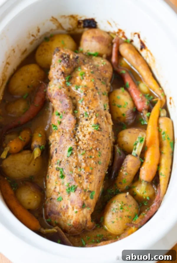 Crock Pot Pork Loin with Vegetables - after slow cooking with fresh parsley sprinkled on top