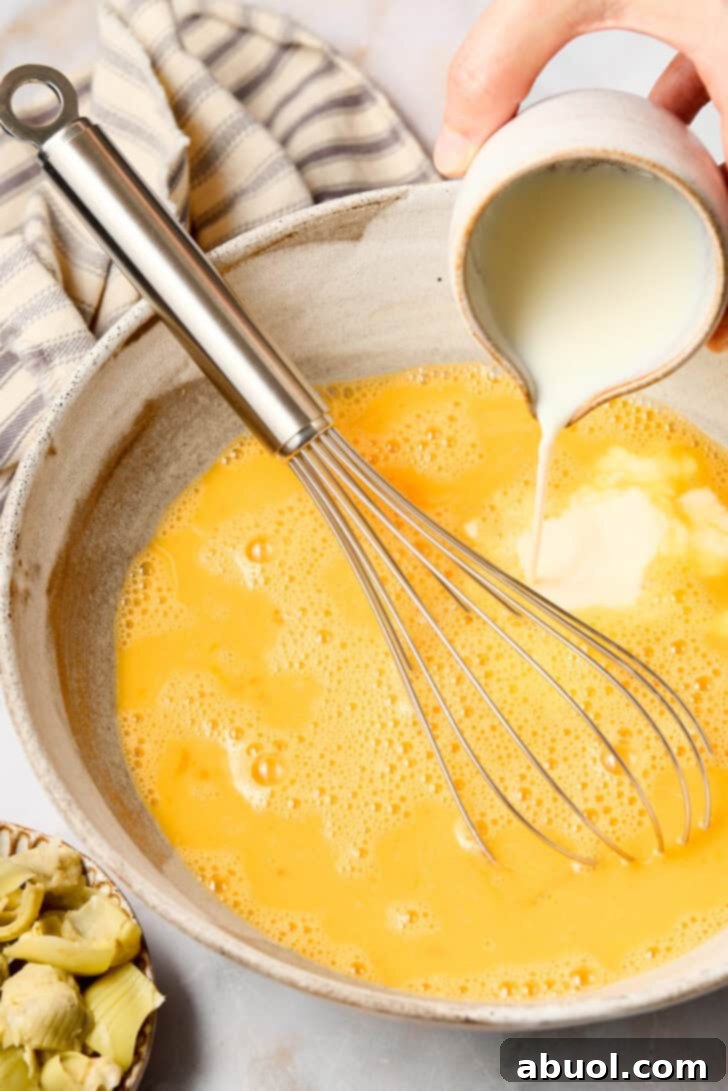 Making egg casserole - mixing ingredients in bowl before baking