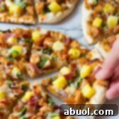 Grilled Chicken Teriyaki Pizza: The perfect sweet and savory pizza for your next cookout.