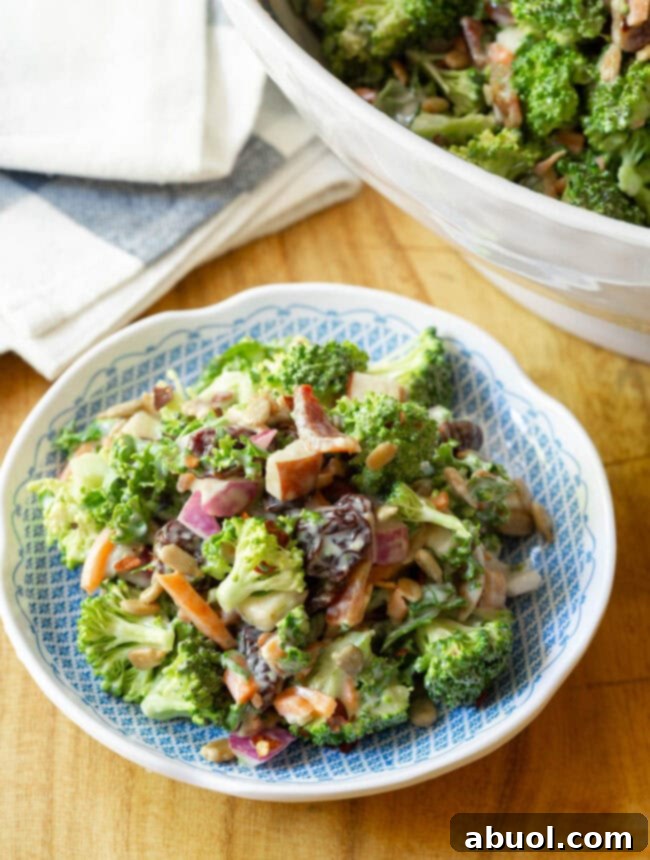 A perfectly plated serving of broccoli slaw salad, garnished and ready to enjoy.