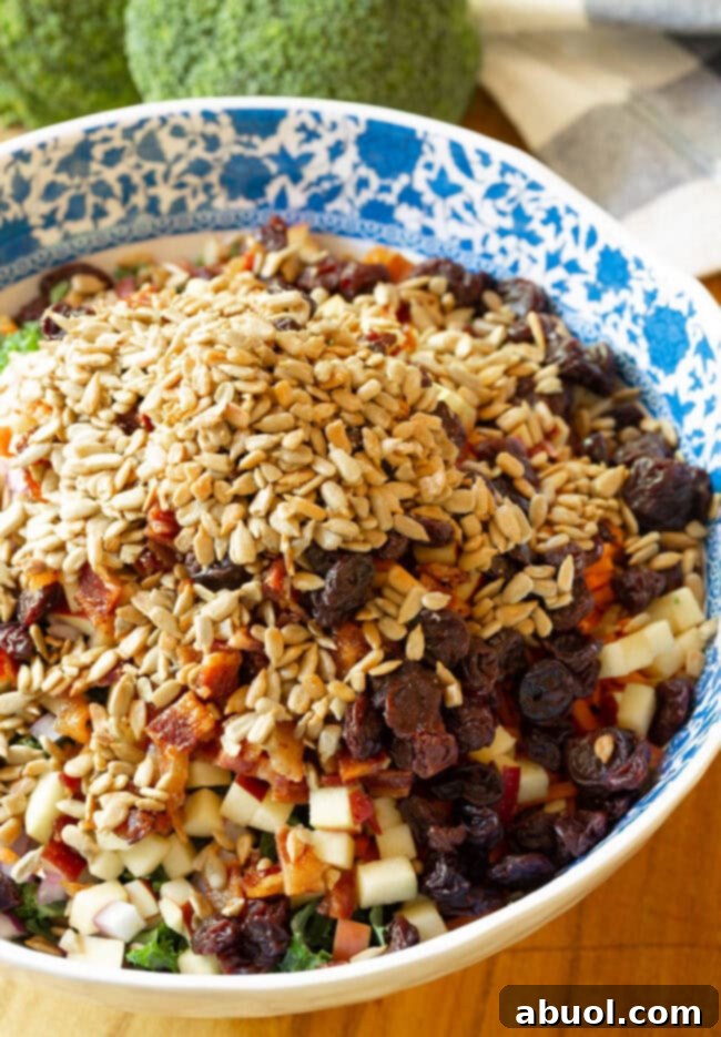 A bowl filled with finely chopped red onion, adding a sharp, vibrant element to the salad.