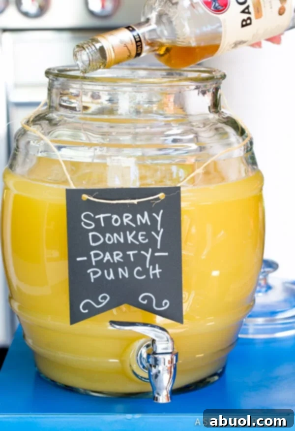Making Stormy Donkey Party Punch - Large Batch Cocktail for Summer & Fall Parties! | ASpicyPerspective.com