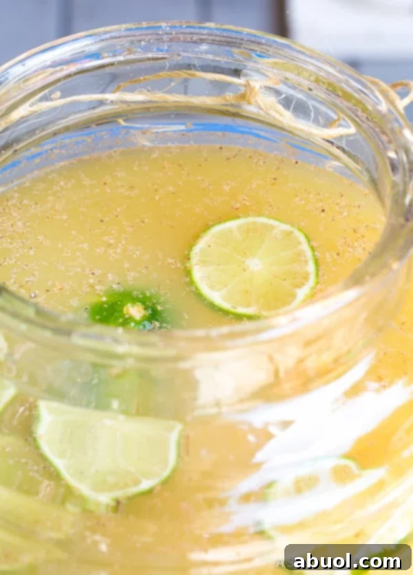 Simple Sparkling Stormy Donkey Party Punch - Large Batch Cocktail for Summer & Fall Parties! | ASpicyPerspective.com
