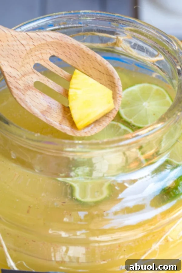 Delicious Stormy Donkey Party Punch - Large Batch Cocktail for Summer & Fall Parties! | ASpicyPerspective.com