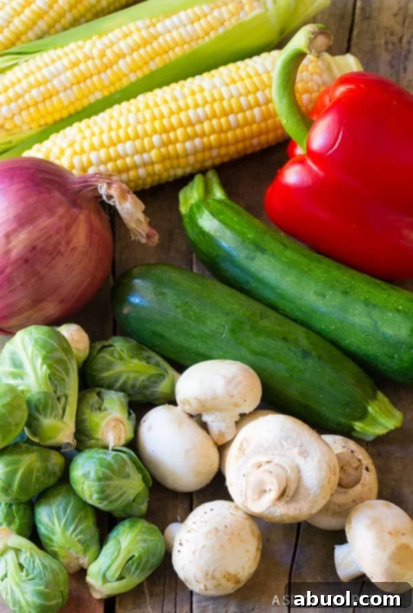 An inviting platter of mixed summer vegetables, showcasing their vibrant colors and readiness for grilling as delicious kabobs.