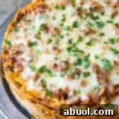 Baked Spaghetti Pie Recipe | ASpicyPerspective.com #retro