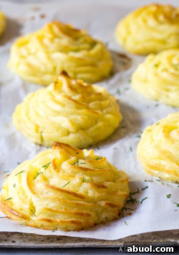 The Best Duchess Potatoes Recipe - close up on baking sheet
