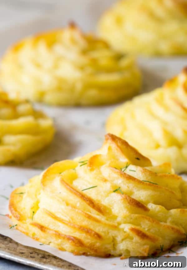 Easy Duchess Potatoes Recipe - golden crispy potatoes close up