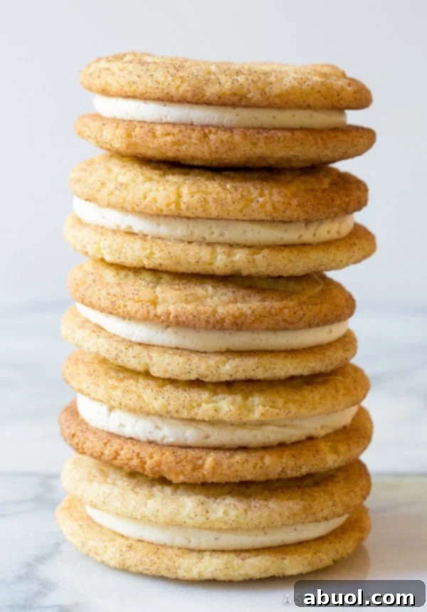 Snickerdoodle Sandwich Cookie Recipe with frosting in between stacked high