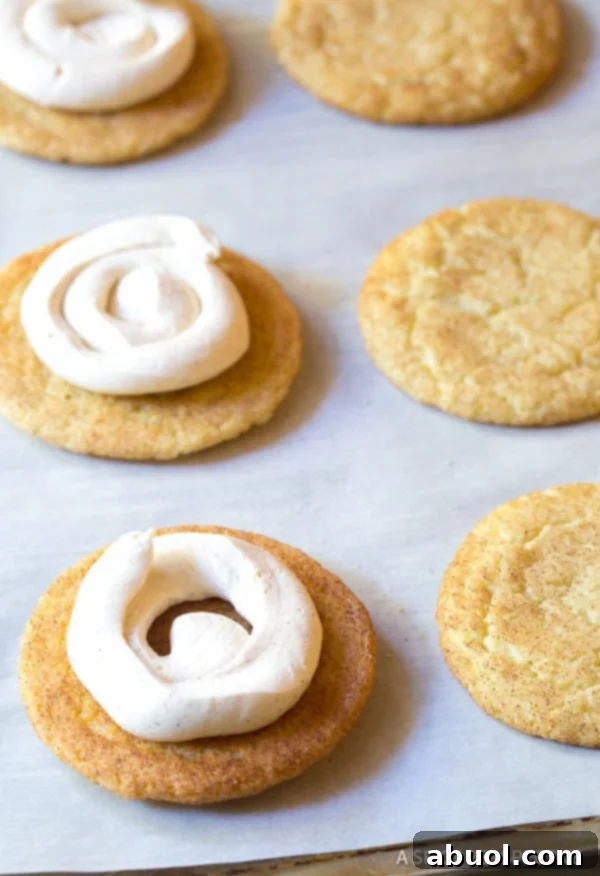 Snickerdoodle Sandwich Cookie Recipe  #ASpicyPerspective #snickerdoodle #cookies #holiday #christmas #whoopiepie