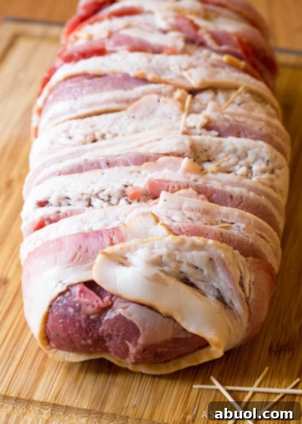 bacon wrapped beef tenderloin - before cooking