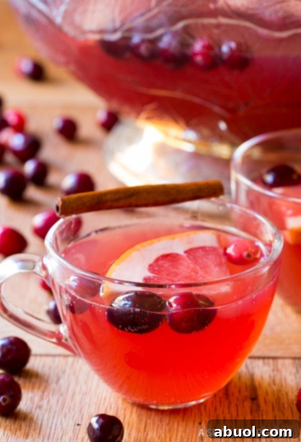 Punch Recipes #ASpicyPerspective Champagne Punch Recipe for the holidays in small punch cups