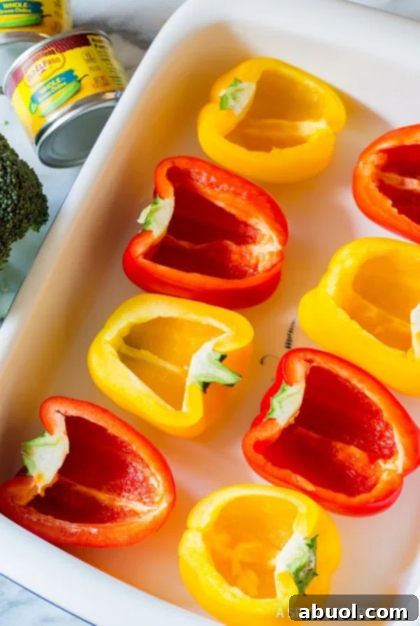 Raw peppers placed in baking tray. 