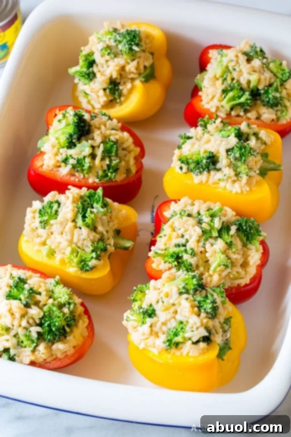 Raw peppers stuffed with rice and broccoli mixture. 