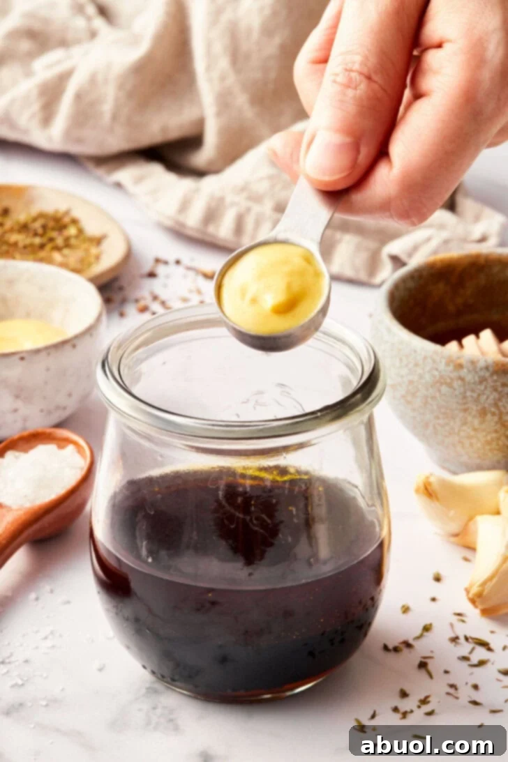 balsamic vinaigrette with a touch of dijon mustard to balance the flavor and thicken the salad dressing