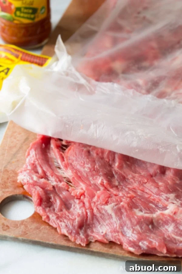 Preparing flank steak for Low Carb Steak Fajita Roll-Ups