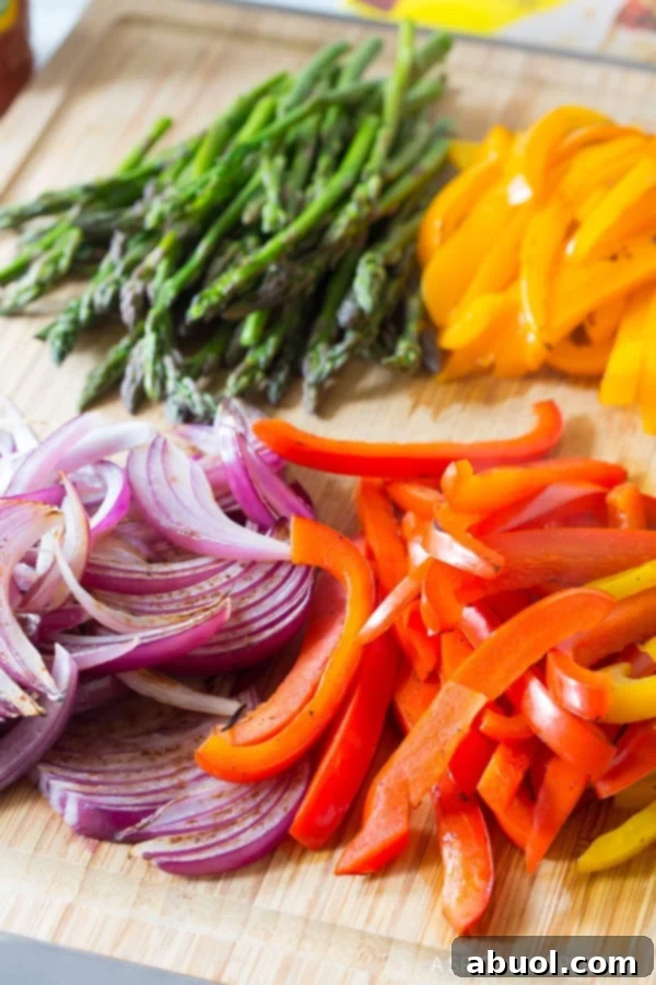 Charring colorful vegetables for Low Carb Steak Fajita Roll-Ups