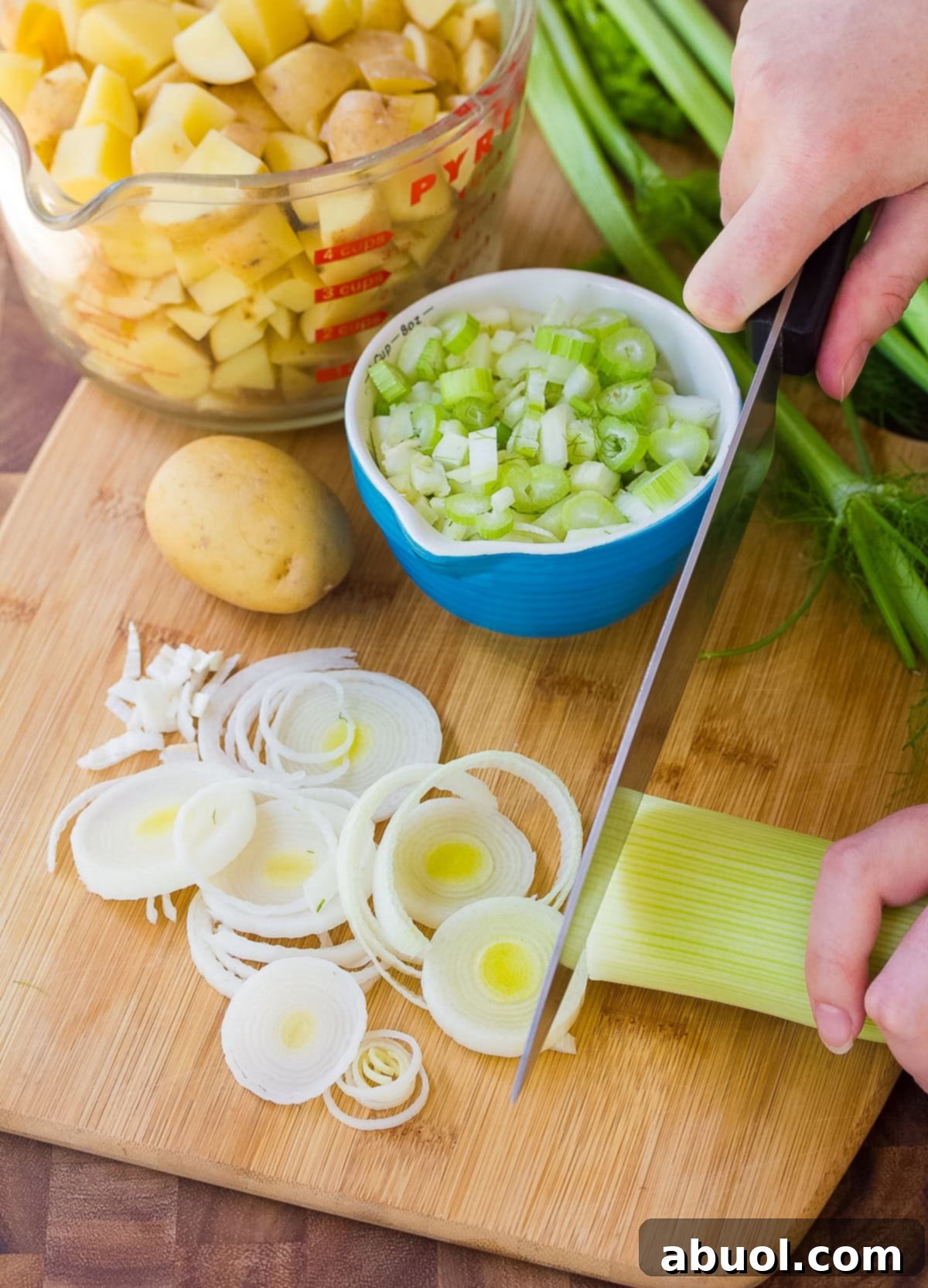 ingredients for new england clam chowder on cutting board