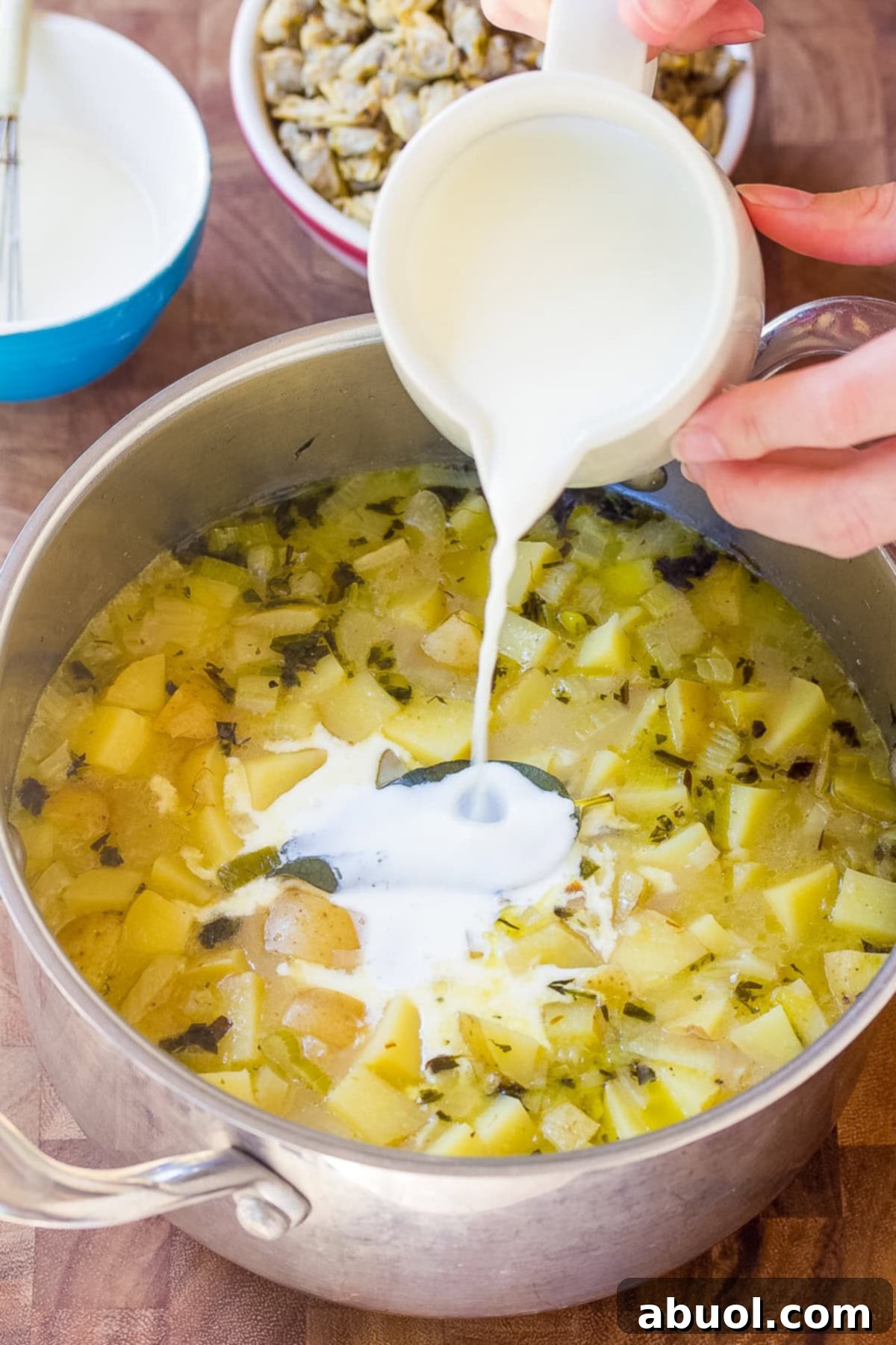 New England Clam - cooking soup in large pot