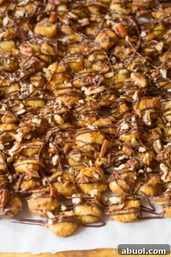 Christmas Crack Recipe #ASpicyPerspective Christmas Crack Recipe laid out on baking sheet to dry