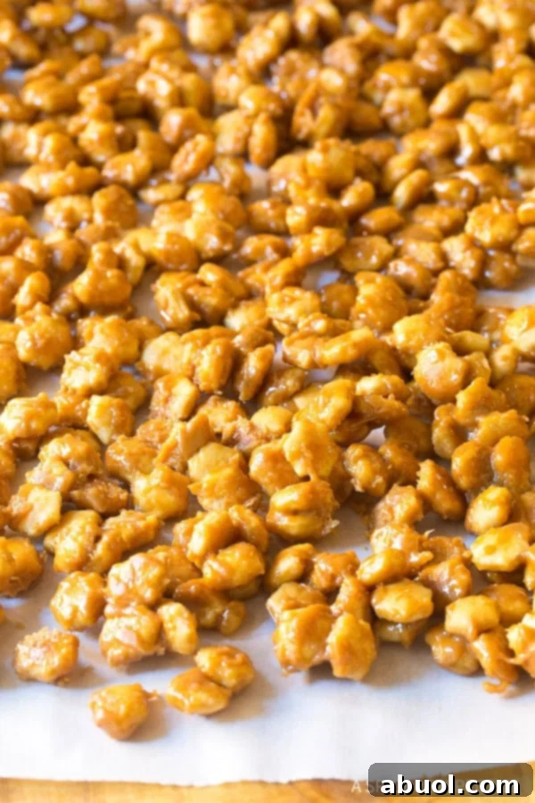 Christmas Crack Candy #ASpicyPerspective Crack Candy drying on parchment paper