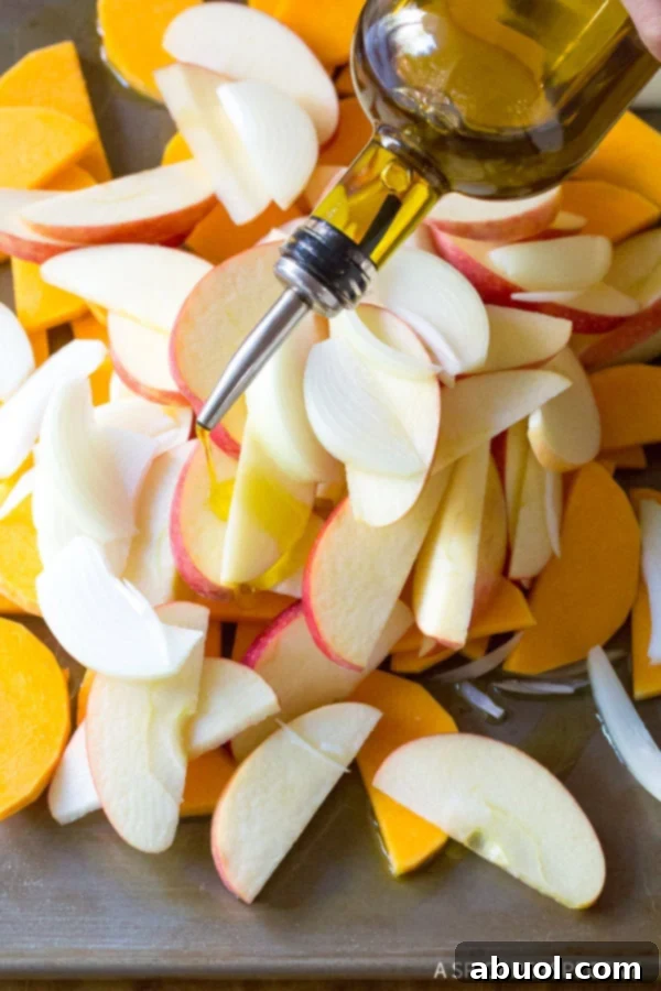 Making Chicken Sausage Apple Squash Sheet Pan Dinner