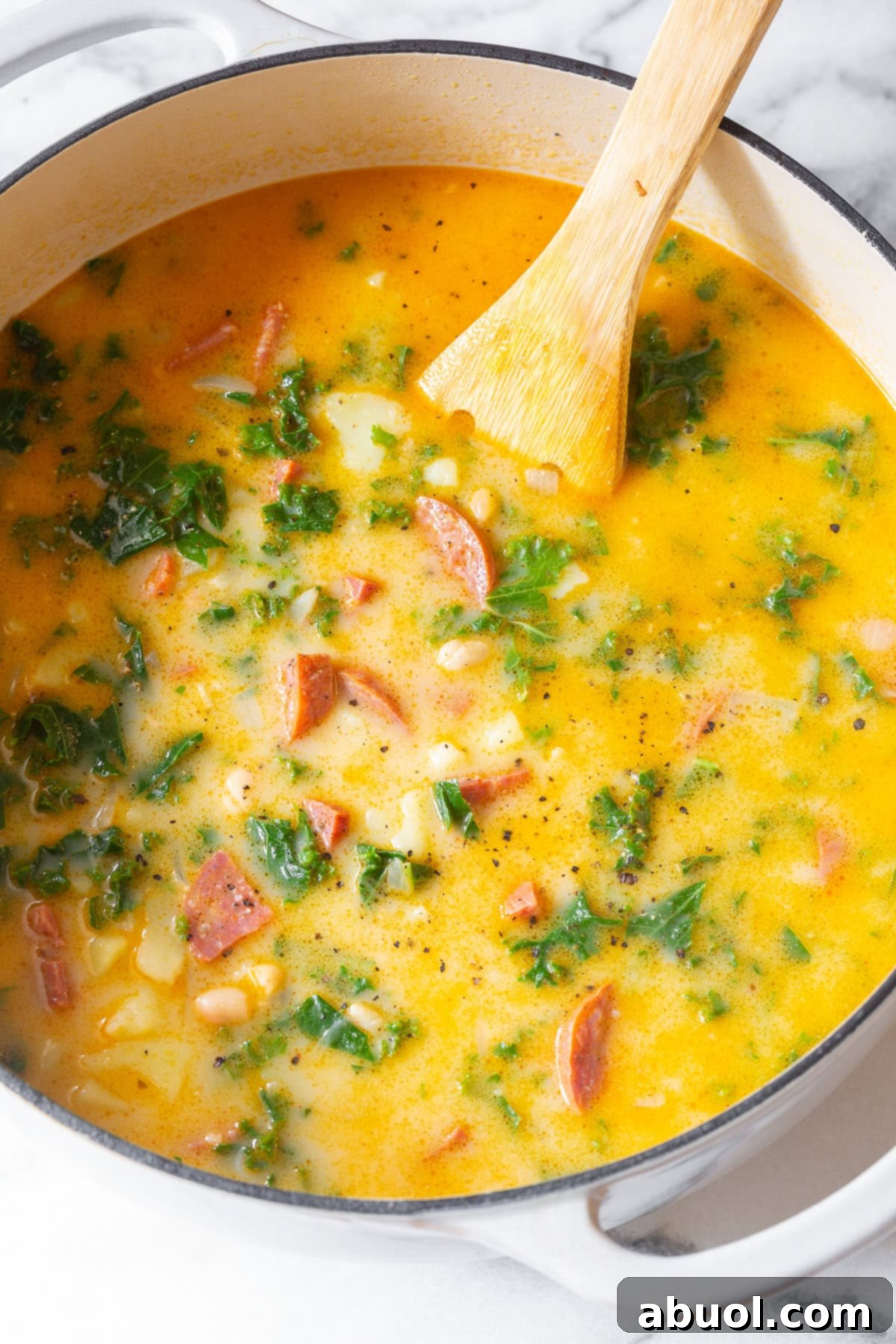 kale soup AKA green soup in pot with sausage 