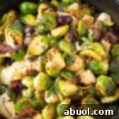 Braised Brussels Sprouts with Sun-Dried Tomatoes, Artichokes, and Olives Recipe